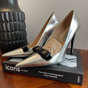 Authentic Prada silver leather pumps with bow